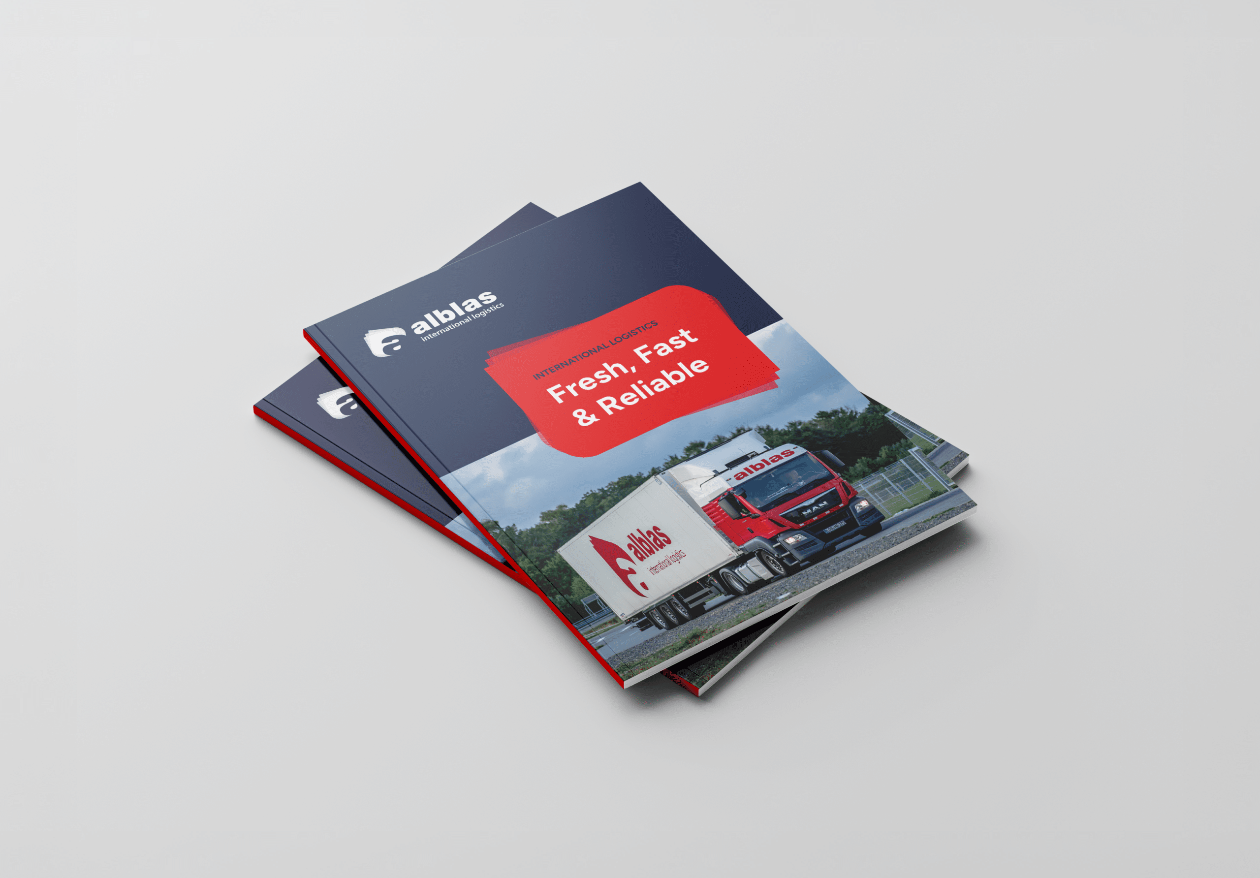 BURO210 Fullservice Marketingbureau Brochure voor Alblas International Transport, met een afbeelding van een rode vrachtwagen. Het is fris, snel en betrouwbaar, voor al uw internationale logistieke oplossingen.